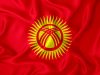 Kyrgyzstan flag on the background texture. Concept for designer solutions.